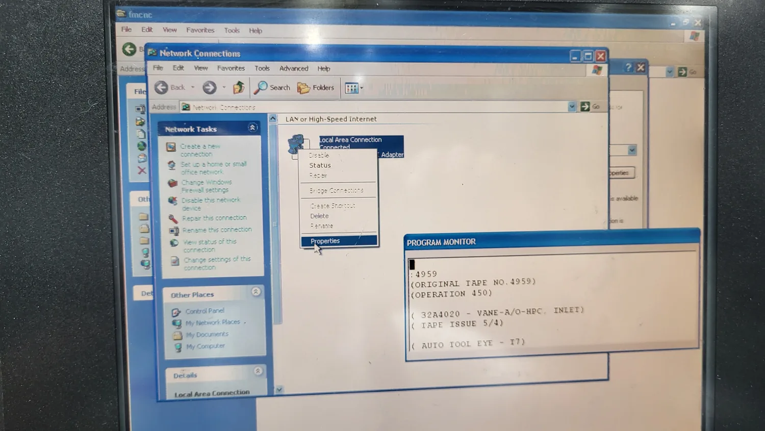Windows XP Network Connections with the Local Area Connection right-click menu open and Properties highlighted